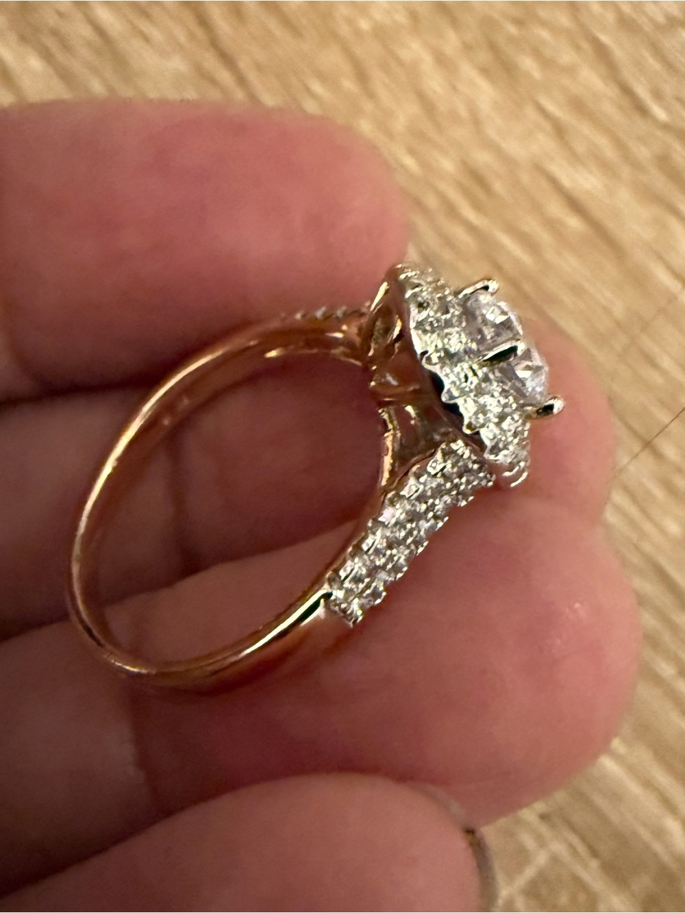 Elegant Rose Gold Halo Engagement Ring with White Stones